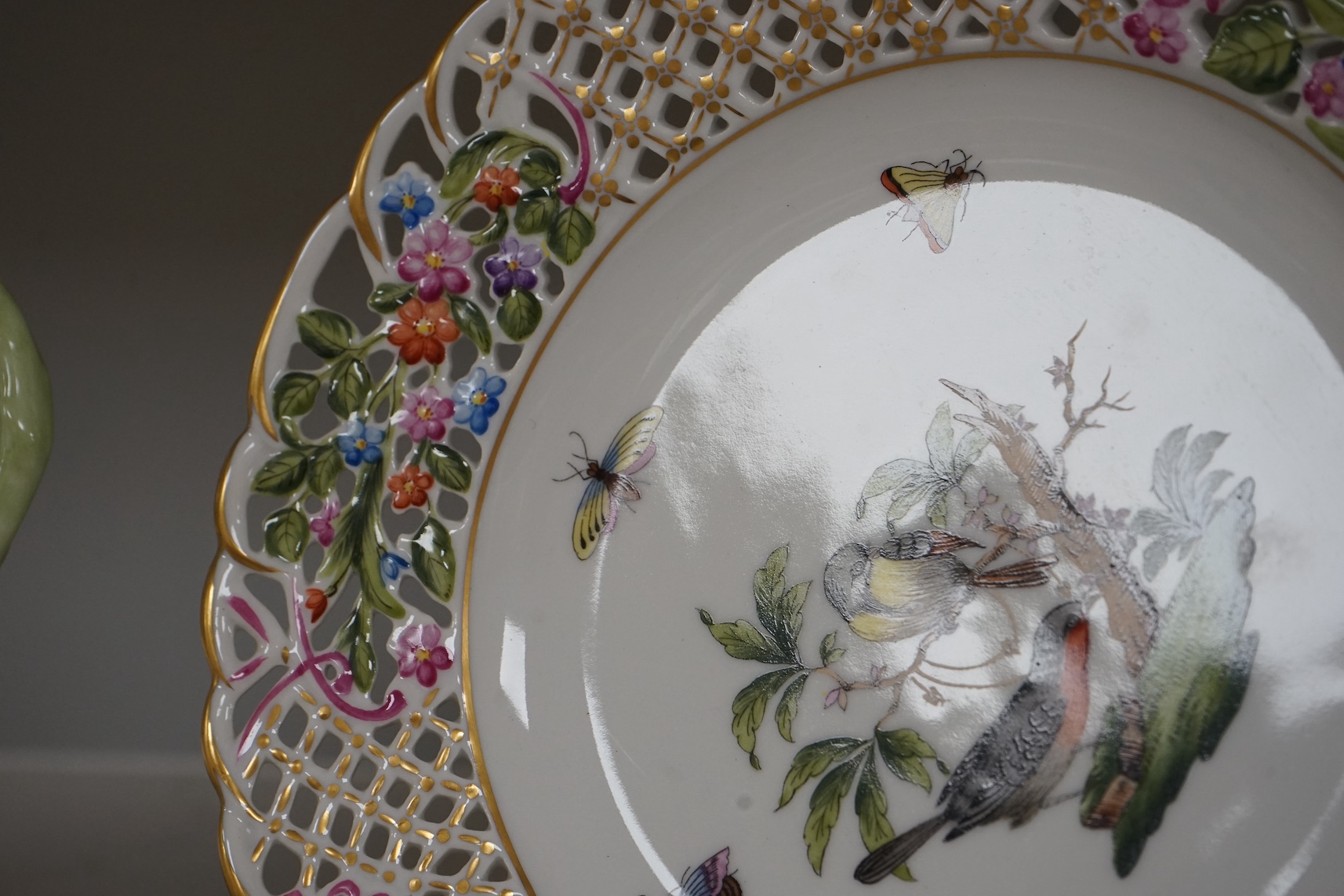 Two Herend Rothschild Bird plates including one with reticulate border, largest 30cm wide. Condition - good